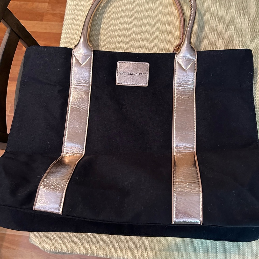 Victorias Secret Large roomy tote bag. Black and gold. NEW 19” W 14” L